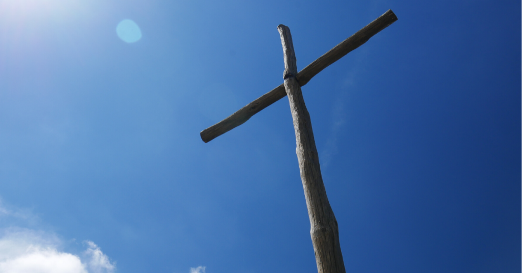 Wooden cross with blue sky